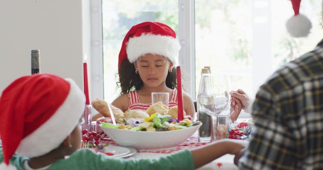 Children Celebrating Christmas Dinner with Santa Hats - Download Free Stock Images Pikwizard.com