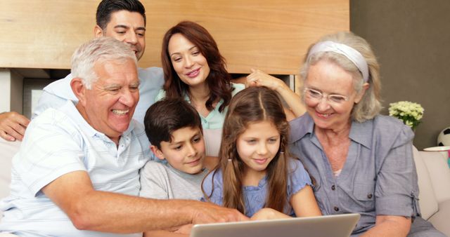 Multi-Generational Family Enjoying Time Together on Laptop - Download Free Stock Images Pikwizard.com