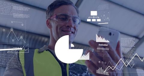 Supervisor monitoring plant data on smartphone with analytics overlay and hi-vis gear