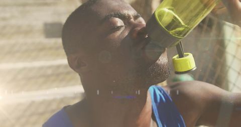 Athlete Rehydrating During Intense Workout