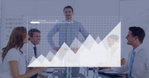 Executive presenting growth chart to team during boardroom meeting with data visualization