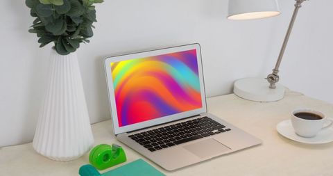 Laptop with Vivid Abstract Background on Simple White Desk - Download Free Stock Images Pikwizard.com