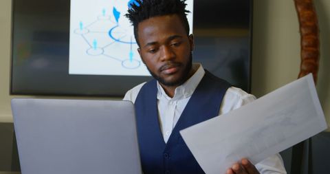 Focused Businessman Analyzing Project Documents
