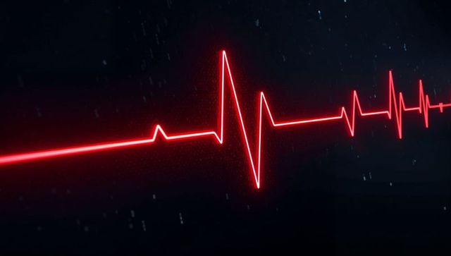Glowing Red Electrocardiogram on Black Background
