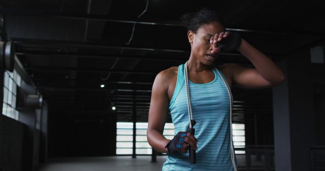 Tired Athlete Taking Break During Intense Workout - Download Free Stock Images Pikwizard.com