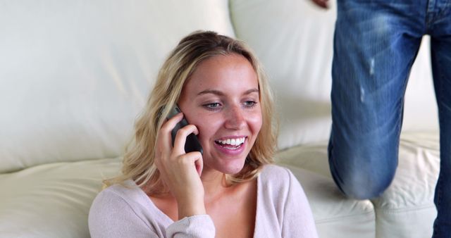 Happy Woman Talking on Smartphone Sitting on Sofa - Download Free Stock Images Pikwizard.com