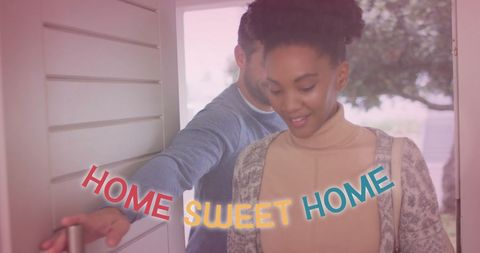Happy Couple Entering New Home with Warm Welcome - Download Free Stock Images Pikwizard.com