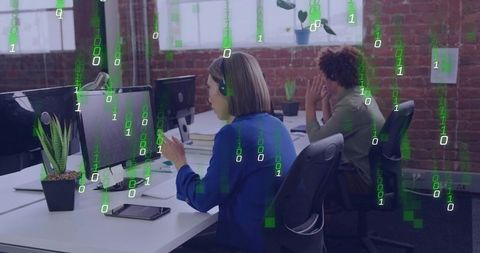 Female agent typing with headset in open-plan office with digital code overlay