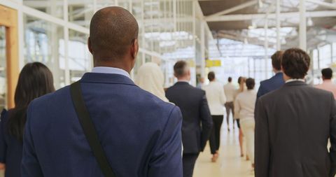 Diverse Professionals Walking Through Busy Office Corridor - Download Free Stock Images Pikwizard.com