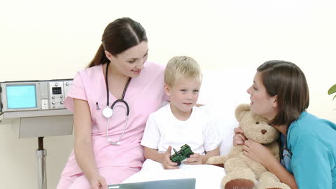 Child Recovering in Hospital with Caring Medical Staff