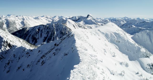 Snow Covered Mountain Range with Clear Blue Sky - Download Free Stock Images Pikwizard.com