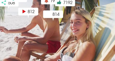 Influencer couple relaxing on tropical beach with social media notifications overlay