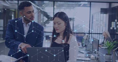 Diverse Professionals Analyzing Digital Network Connections