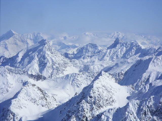 Snowy Mountain Range Under Clear Blue Sky - Download Free Stock Photos Pikwizard.com