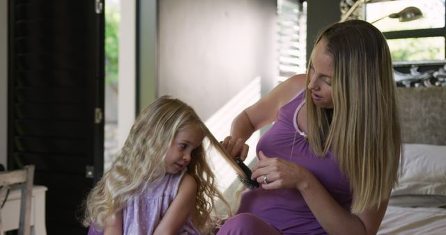 Mother Combing Daughter's Hair at Home, Bonding Moments - Download Free Stock Images Pikwizard.com