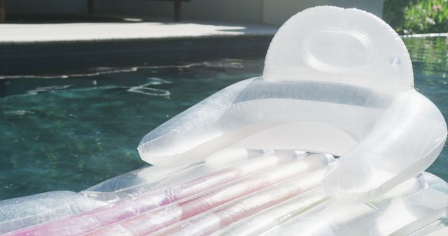 Inflatable Lounger in Refreshing Pool Water on Sunny Day - Download Free Stock Images Pikwizard.com