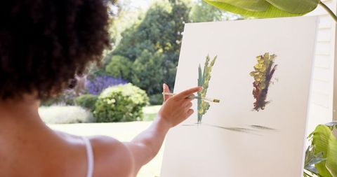 Outdoor Painting Scene with Female Artist Blossoms on Canvas