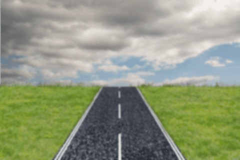 transparent road through lush green field under dramatic sky - Download Free Stock Videos Pikwizard.com