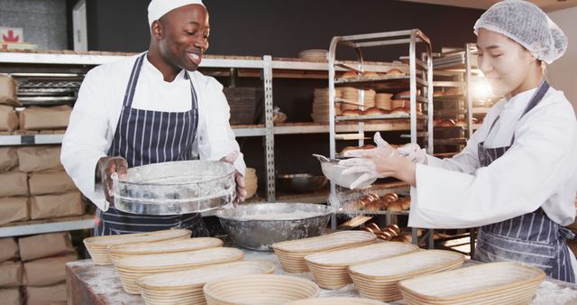 Multiracial bakers preparing dough in commercial kitchen - Download Free Stock Images Pikwizard.com