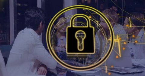 Business Team Collaborating Around Laptop with Neon Padlock Symbolizing Cybersecurity