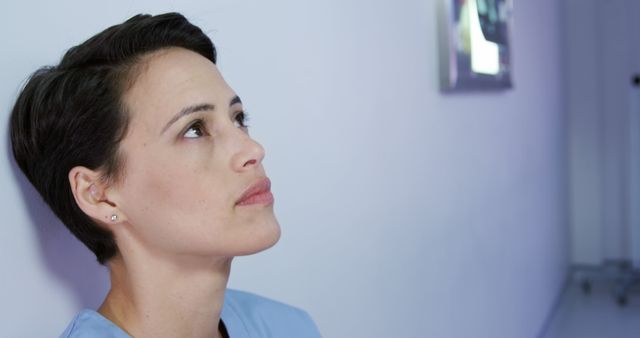 Female Nurse Reflecting Against Hospital Wall - Download Free Stock Images Pikwizard.com