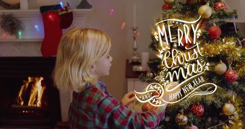 Festive Child Decorating Christmas Tree with Merry Christmas Text Overlay