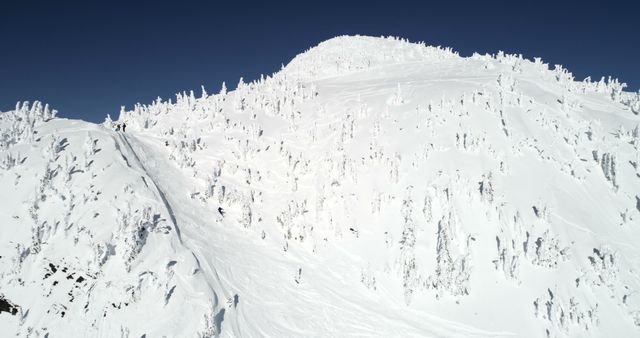 Snowy Mountain with Slope and Skiers under Clear Blue Sky - Download Free Stock Images Pikwizard.com