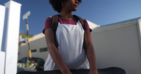 Skateboarding Enthusiast in Urban Summer Setting
