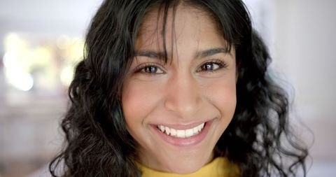 Close-Up of Biracial Teenage Girl Smiling at Home - Download Free Stock Images Pikwizard.com