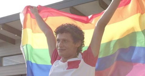 Joyful Man Celebrating with LGBT Pride Flag Outdoors - Download Free Stock Images Pikwizard.com