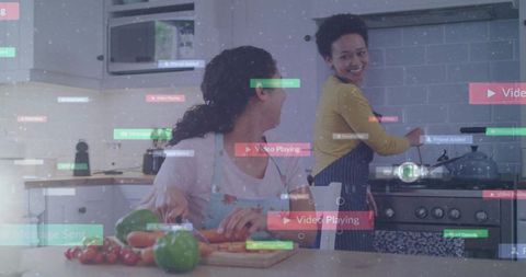 Friends cooking with augmented reality overlays chopping vegetables on cutting board