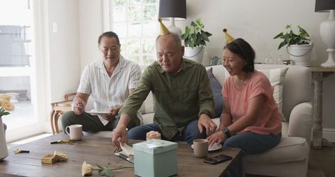 Joyful Birthday Celebration with Elderly Friends at Home