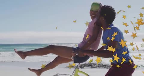 Joyful Couple at Beach with Bicycle