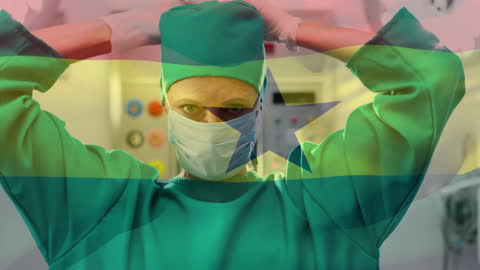 Caucasian Surgeon Masked with Ghana Flag Overlay in Hospital