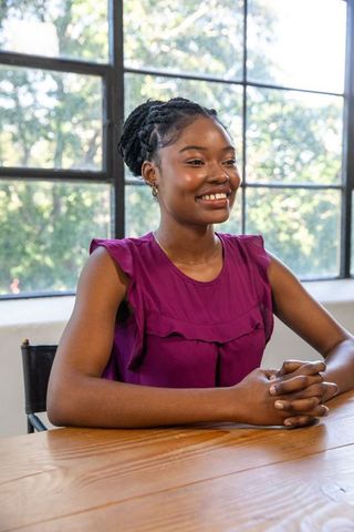 Confident professional woman in natural lighting setting