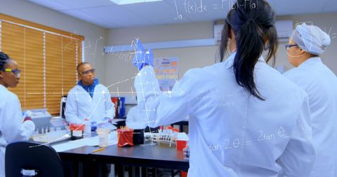 Diverse Team of Scientists Analyzing Data in Laboratory - Download Free Stock Images Pikwizard.com