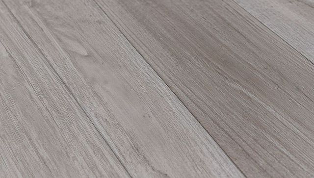 Light Gray Brown Wood Plank Flooring Showing Subtle Grain, Knots and Matte Texture