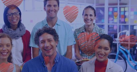 Diverse Team Collaborating Joyfully in Creative Workspace