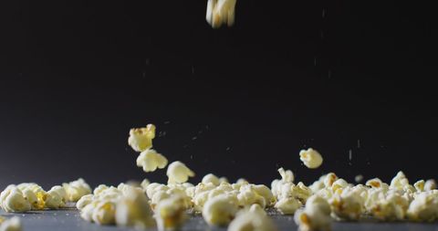 Popcorn Falling with Black Background Highlighting Freshness - Download Free Stock Images Pikwizard.com
