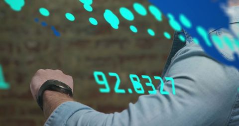 Businessman Checking Smartwatch with Financial Analytics Graphics