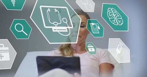 Woman Engaging with Digital Healthcare Interafce in Hospital