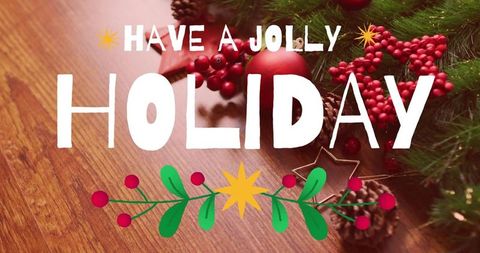 Have jolly holiday lettering decorating rustic wood with evergreen sprigs, ornaments, pinecones