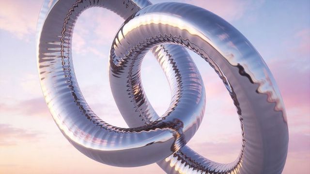Floating interlocked chrome torus rings with serrated ripples against pastel sunrise sky