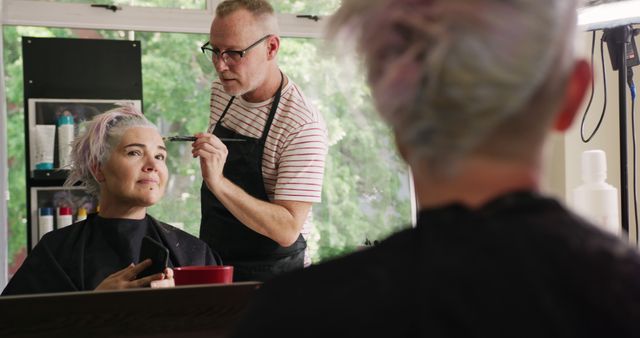 Hairdresser Coloring Woman's Hair in Modern Salon - Download Free Stock Images Pikwizard.com