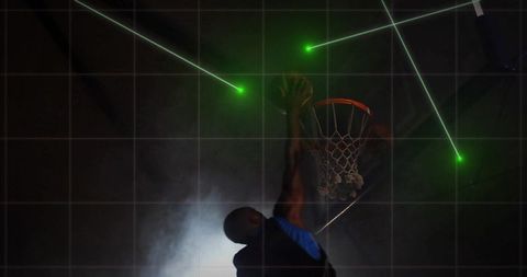 Dynamic basketball dunk in futuristic green laser display