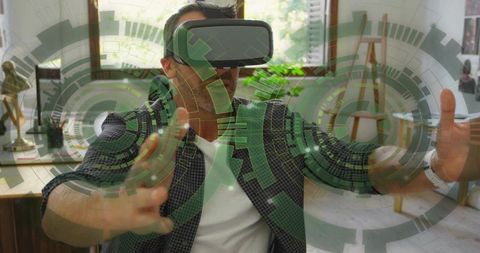 Man wearing vr headset reaching through futuristic green hud in home office