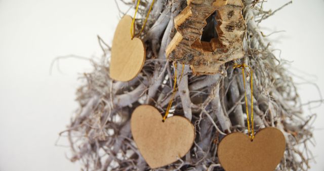A charming, rustic birdhouse with heart ornaments offers a cozy touch for country decor. - Download Free Stock Photos Pikwizard.com