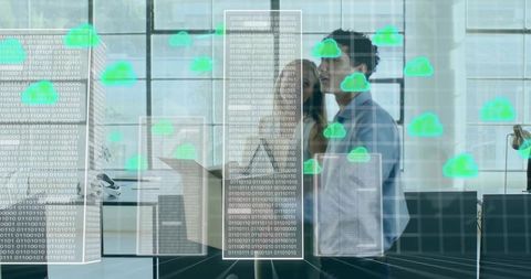 Team analyzing cloud data overlays with binary analytics in modern open-plan office