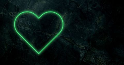 Green Neon Heart Glowing on Dark Stone Background - Download Free Stock Images Pikwizard.com