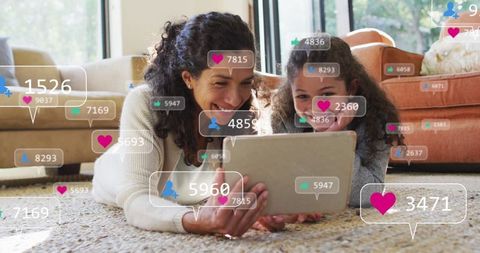 Mother and Daughter Bonding with Tablet and Social Media Graphics